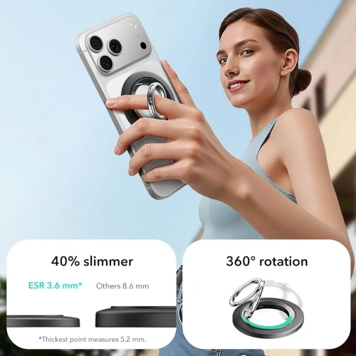 Uchwyt ESR w użyciu, trzymający telefon w stabilnej pozycji na biurku.